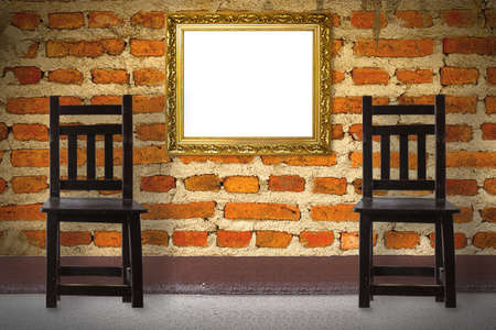 Wooden Chair vintage with frame  in front brick wallの写真素材