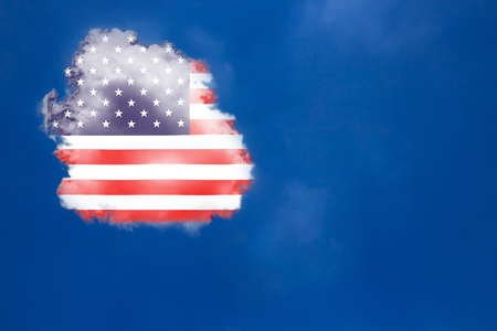 Flag American cloud in the blue skyの写真素材