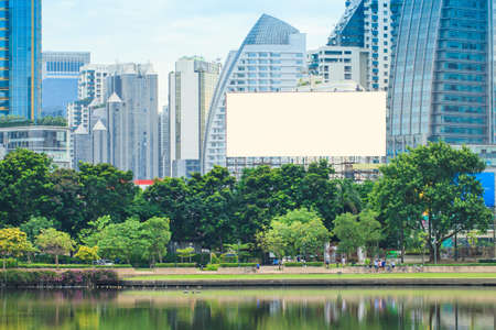 Blank billboard with park for new advertisementの写真素材