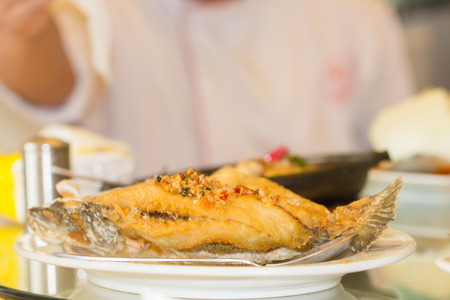 Snapper fish fried on dish