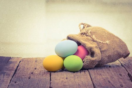 multi color eggs on wood table