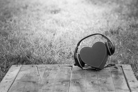 Headphones with red heart. love music. vintage retro,black and whiteの写真素材
