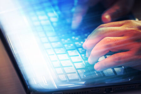 Blured Business man using laptop