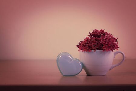 Valentines Day background with heart and flowerの写真素材