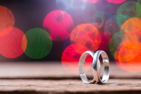 Wedding rings with bokeh backgroundの写真素材