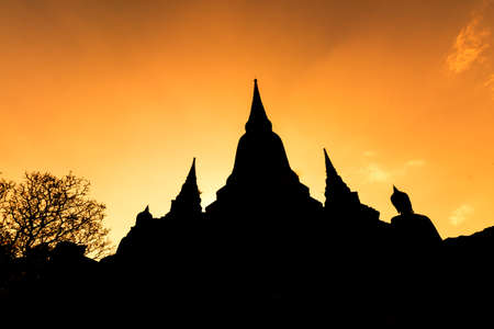 Silhouette of Wat Yai Chai Mong Khol Temple of Ayuthaya Province ( Ayutthaya Historical Park ) Thailandの写真素材