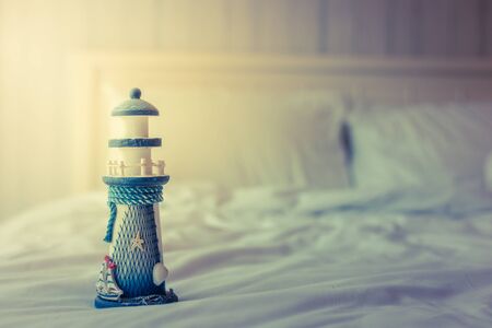 Model wooden lighthouse in vintage filterの写真素材
