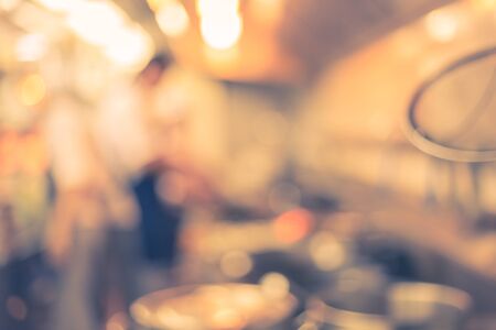 motion blur chefs of a restaurant kitchenの写真素材