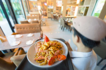 Lobster with egg in restaurantの写真素材