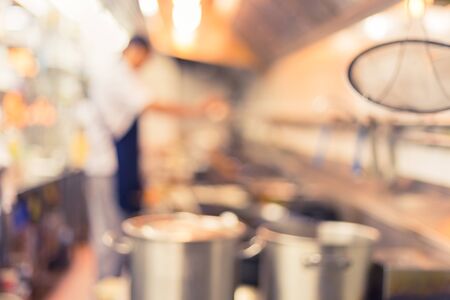 motion blur chefs of a restaurant kitchenの写真素材
