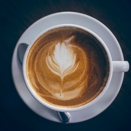 coffee on wood background,vintage fillterの写真素材