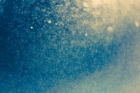 abstract light bokeh background,deep blue colorの写真素材