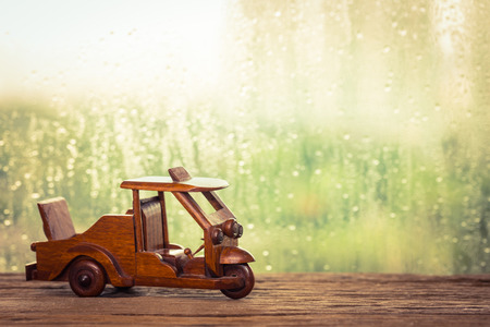 Small wooden toy car, Tuk Tuk Thailandの写真素材