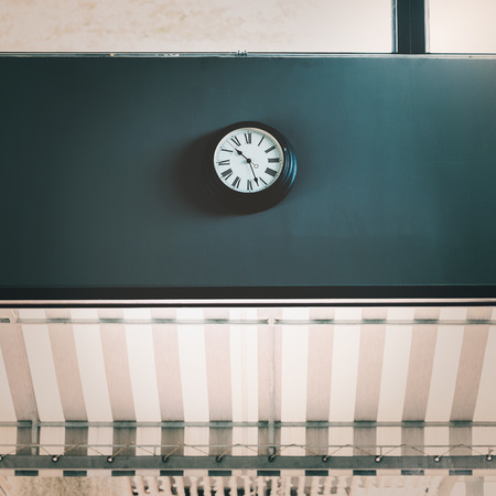 vintage of clock on wallの写真素材