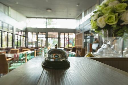 Restaurant service bell vintage with bokehの写真素材
