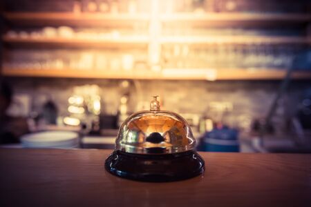 Restaurant service bell vintage with bokehの写真素材