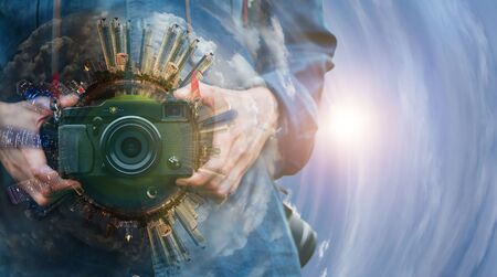Man hand holding retro photo camera outdoor hipster Lifestyle, Double exposure Photographyの写真素材