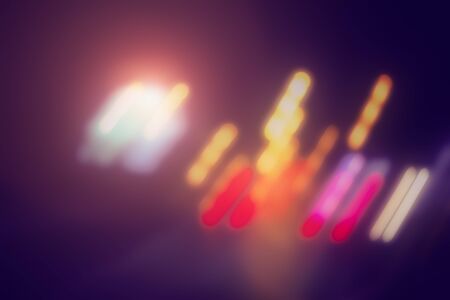 Blurred Defocused Lights of Heavy Traffic on a Wet Rainy