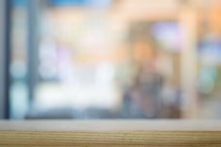 Blurred background with wood tableの写真素材