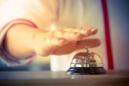 Restaurant bell vintage with handの写真素材