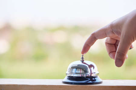 Bell on counter for service with blurred backgroundの写真素材