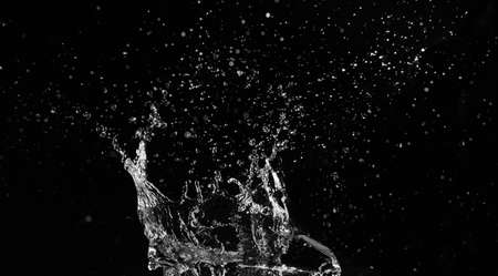 Water splash on dark backgroundの写真素材