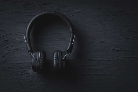 Music relax concept, Headphone on dark texture backgroundの写真素材