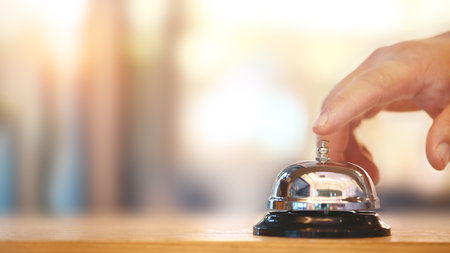 Bell on counter for service with blurred background