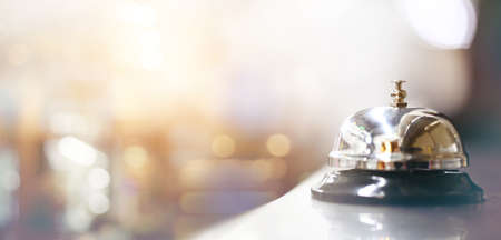 Bell on counter for service with blurred backgroundの写真素材