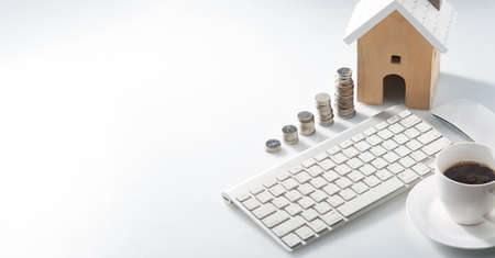 Workspace for house savings plans for housing, coin stack for living, home and real estate...