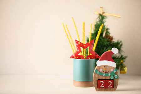 Snowman with number of new year and christmas treeの写真素材