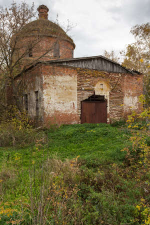 abandoned church of autumn treesの写真素材