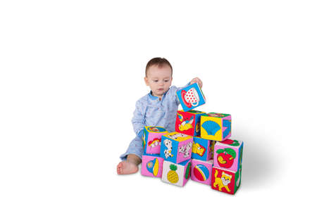 Baby boy with soft cubesの写真素材