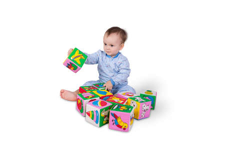Baby boy with soft cubesの写真素材