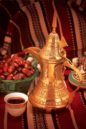 Traditional Arabic Ramadan setup for coffee with datesの写真素材