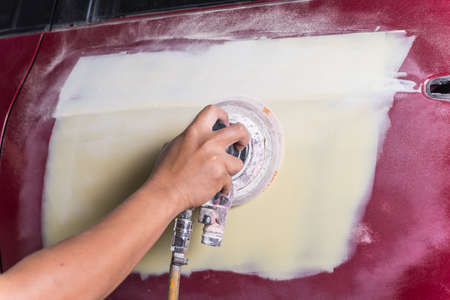 Auto body repair series : Sanding puttyの写真素材