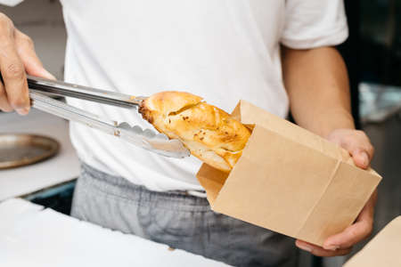 Chef making garlic breadの写真素材