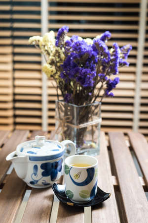 Tea set on wooden tableの写真素材