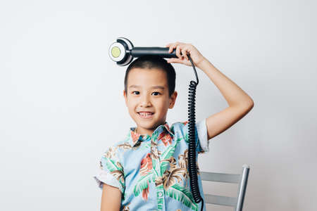 Asian family series : Asian boy in studioの写真素材