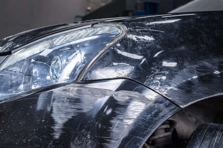 Auto body repair series : Black car scratchの写真素材