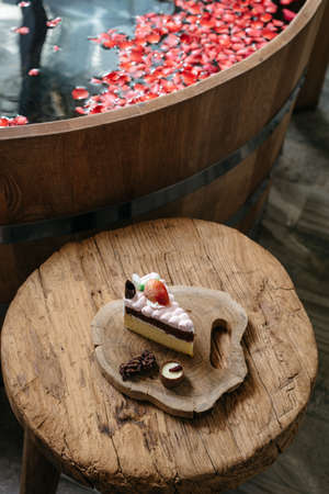 Onsen series : Strawberry shortcake by wooden bathtubの写真素材