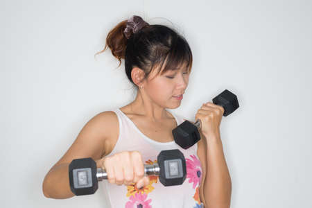 Exercise series : Asian woman exercisingの写真素材
