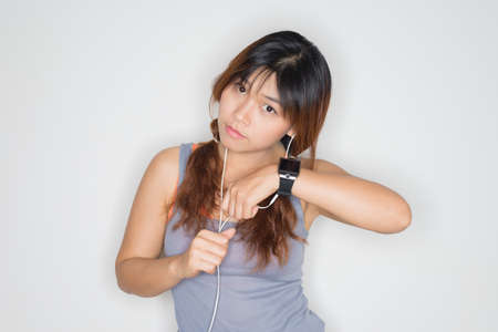 Lifestyle series ; Asian woman using smart watchの写真素材