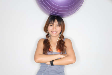 Exercise series : Asian woman exercising with fitness ball