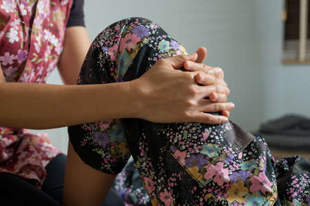 Massage series : Therapist massaging Asian woman's legの写真素材