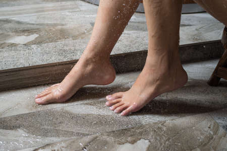 Onsen series : Closeup of Asian woman feet in bathroomの写真素材