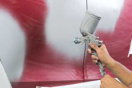 Auto body repair series : Spraying primerの写真素材