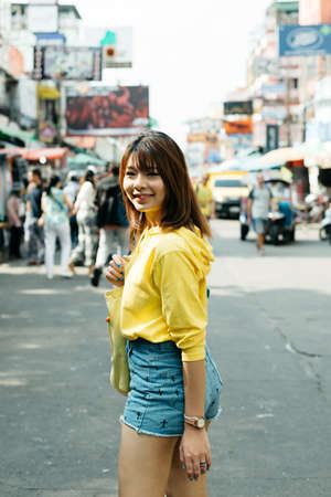 Lifestyle series: Young Asian woman in the street of Bangkok, Thailandの写真素材