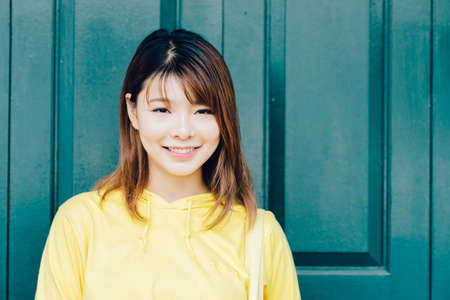 Lifestyle series: Young Asian woman in the street of Bangkok, Thailandの写真素材