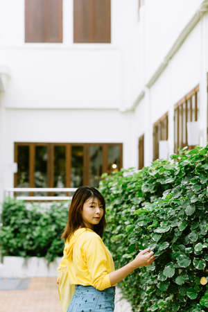 Lifestyle series: Young Asian woman in the street of Bangkok, Thailandの写真素材